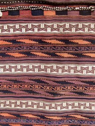 Complete Baluch khorjin in beautiful condition, fine weave, floppy handle, and wonderful design, first quarter of the 20th century, all dyes natural except for the pale rosy orange which faded from a  ...