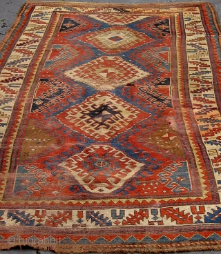 Fresh from a local estate, an antique Caucasian long rug, all natural dyes, 8'9"by 4'5", with some condition issues that will require some restoration as seen in photos.  This rug is  ...