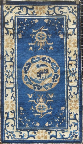 Antique last quarter of the nineteenth century Chinese carpet, lovely small size (30" by 52"), in nice antique condition.  Please ask for additional photos if needed.      