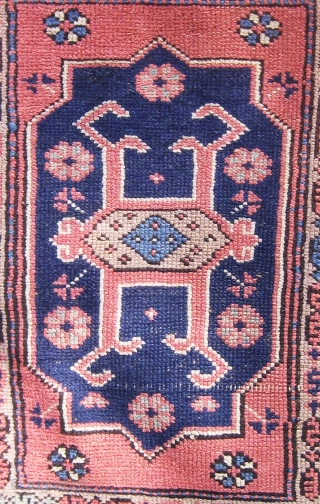 Antique Bergama area Canakkale carpet, circa 1900.  Very unusual format with four large cartouches in the field.  Edges original.  Muted palette with a lovely blue-green not obvious in photos.  ...