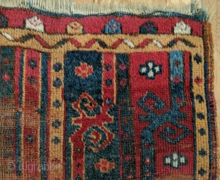 Antique Central Anatolian (Kirsehir area) yastik, with a field composed of three vertical bands with meander vine motifs.  Last quarter of the nineteenth century or before.  All dyes natural.   ...