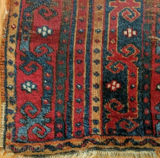 Antique Central Anatolian (Kirsehir area) yastik, with a field composed of three vertical bands with meander vine motifs.  Last quarter of the nineteenth century or before.  All dyes natural.   ...