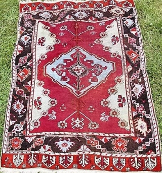 Antique Anatolian carpet, early 1900s, complete and in fair condition with brown oxidation as expected.  Dyes look good to my eye. 67" by 45".  Please ask for additional photos if  ...