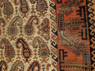 Rare antique Baluch runner with beautifully drawn botehs on a pale camel field.  Lovely shades of pale, medium, and dark blue.  Original flat woven ends and sides.  All colors  ...