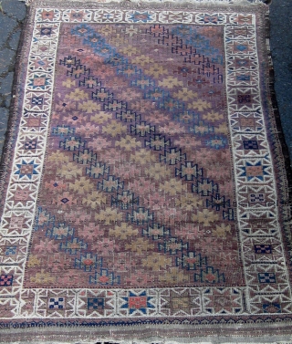 Antique small Baluch rug, symmetrically knotted, with a lovely array of light shades including aubergine, various hues of blue, rose, violet, etc.  Complete with kilim ends, all dyes appear natural with  ...