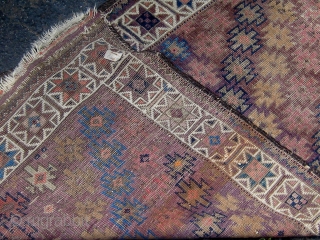 Antique small Baluch rug, symmetrically knotted, with a lovely array of light shades including aubergine, various hues of blue, rose, violet, etc.  Complete with kilim ends, all dyes appear natural with  ...