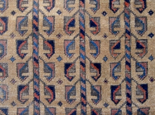 Small antique Baluch camel ground rug with a tree of life variant design, last quarter of the nineteenth century, some wear mainly around the perimeter, edges redone, flat weave ends missing.   ...