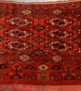 Antique Kizil Ayak chuval, Ersari sub-group, Middle Amu Darya area, with characteristic saturated brick red ground, chemcheh minor guls, in lovely condition, complete skirt and sides. All dyes appear natural, which makes  ...