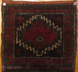 Wonderful small Baluch chanteh, 19th century, in beautiful condition, with original ends and sides.  All dyes natural including desirable green.  Roughly 10" by 17".  Please ask for more photos 