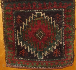 Wonderful small Baluch chanteh, 19th century, in beautiful condition, with original ends and sides.  All dyes natural including desirable green.  Roughly 10" by 17".  Please ask for more photos 