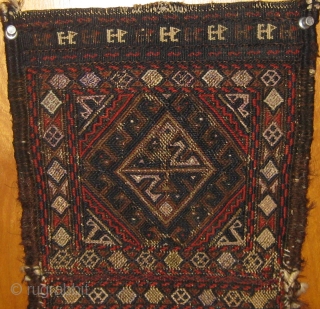 Antique 19th Century flat weave Baluch chanteh.  In good condition with selvedges partially reattached (see photos).  Silk (pale violet) and metal thread details.  Roughly 16" by 9".  Please  ...