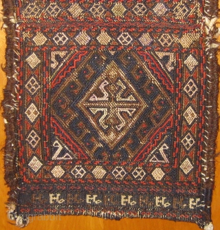 Antique 19th Century flat weave Baluch chanteh.  In good condition with selvedges partially reattached (see photos).  Silk (pale violet) and metal thread details.  Roughly 16" by 9".  Please  ...