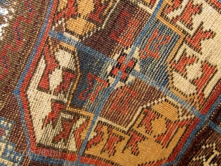 Antique Baluch (symmetrically knotted) carpet, beautiful light palette with pale blues, rose, violet, etc. in natural dyes.  1890-1900.  Generally good condition, with original edges, good pile in the lower half,  ...