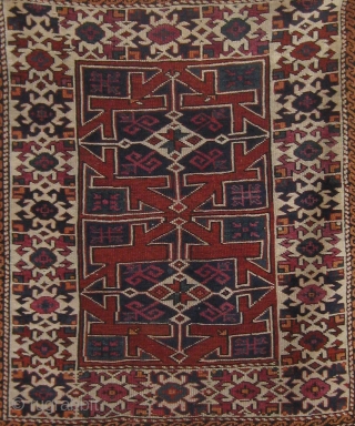 Antique Canakkale (Bergama area).  19th Century.  All natural dyes including cochineal.  Beautiful condition, with original ends and sides and medium to full pile all over.  43" by 37".  ...