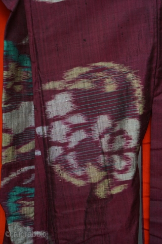 Antique Japanese silk hand-woven ikat kimono, burgundy silk with red and coral silk lining,  in good condition. Circa 1920.             