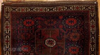 Antique Baluch bagfront, 19th Century, all natural dyes, in overall good condition, complete sides and ends, 34" by 27".  Please ask for additional photos.        