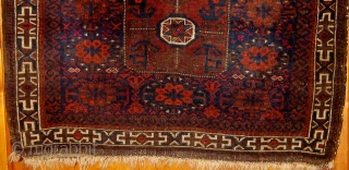 Antique Baluch bagfront, 19th Century, all natural dyes, in overall good condition, complete sides and ends, 34" by 27".  Please ask for additional photos.        