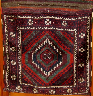 Antique Baluch (Mushwani) khorjin in pristine condition, circa 1900, all natural dyes, beautiful silky wool, all original.  28" by 64".  Please ask for additional photos.      