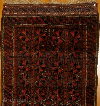 Small antique Baluch carpet (designed like a large balisht), pristine condition, original ends and edges, all natural dyes, circa 1900.  47" by 23". This rug was stored for half a century  ...