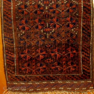 Small antique Baluch carpet (designed like a large balisht), pristine condition, original ends and edges, all natural dyes, circa 1900.  47" by 23". This rug was stored for half a century  ...