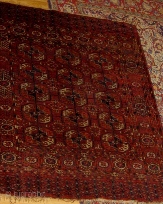 Antique Tekke "dowry rug", circa 1880. Ends and sides original, lower right corner a little compromised otherwise good condition.  Floppy handle, all dyes appear pre-synthetic.  Please ask for additional photos. 