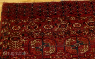 Antique Tekke "dowry rug", circa 1880. Ends and sides original, lower right corner a little compromised otherwise good condition.  Floppy handle, all dyes appear pre-synthetic.  Please ask for additional photos. 