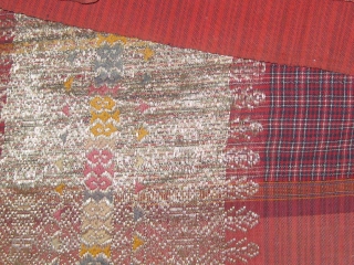 Antique West Sumatra Minangkabau Songket (large hip cloth).  Silk, cotton, and gold thread.  19th century.  In good condition.  75cm by 246cm.        