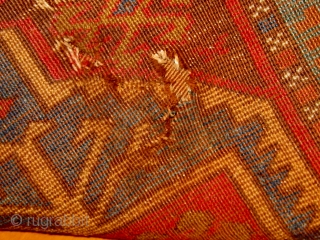 Antique central Anatolian yastik, 19th Century,  distressed but still noble, all natural dyes, 22" by 39".  Please ask for additional photos.          