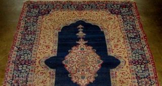 Antique Persian Kerman (circa 1910), open blue field with medallion, finely knotted, 3' 10" by 7' 4".  Some wear, in need of a good bath.   Please ask for additional  ...