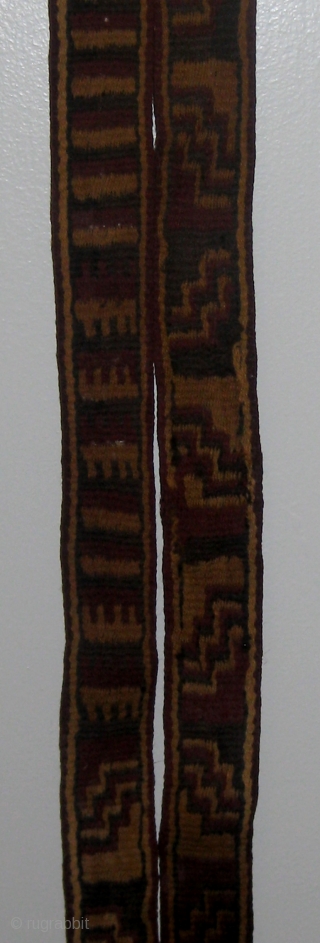 Pre-Columbian Nazca culture camelid fibers band or sash, possibly originally used as mummy wrap.  8' 2" long and over 1 1/2" wide.  One end has been cut, the other is  ...