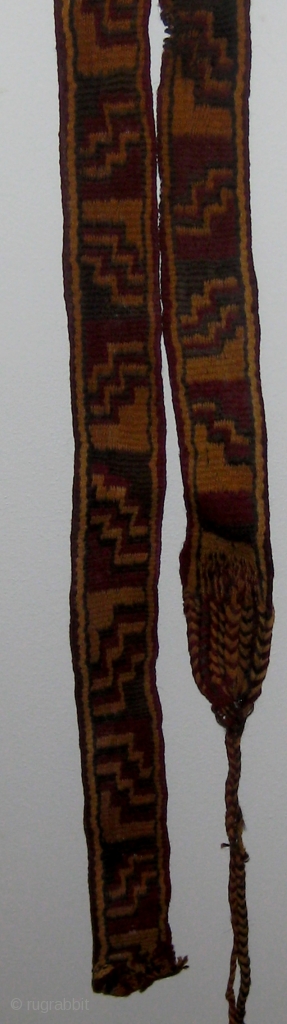 Pre-Columbian Nazca culture camelid fibers band or sash, possibly originally used as mummy wrap.  8' 2" long and over 1 1/2" wide.  One end has been cut, the other is  ...