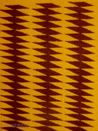 Early 20th Century unusual small Navajo weaving, extremely graphic, with only two colors used.  In pristine condition.  11" by 19".  Please ask for additional photos.     