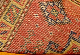 From a Baluch collection a very unusual bagface, 19th century, 20" by 25", original selvages, beautiful yellow border, silky wool, floppy handle, all natural dyes.  Please ask for additional photos.  