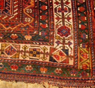 Antique Kurdish Sauj Bulagh "main carpet", last quarter of the nineteenth century, 5' by 8'5", in lovely condition, with one end still retaining its original flatweave finish.  Red wefts as is  ...