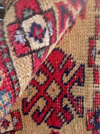 Antique Western Anatolian Kurdish yastik, golden ground, with three  shades of blue, highly saturated red, etc.  All dyes appear natural.  Circa 1890-1910.  Original sides.  All wool construction.  ...