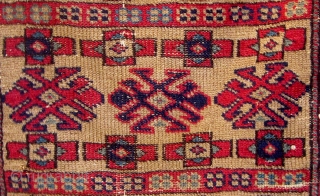 Antique Western Anatolian Kurdish yastik, golden ground, with three  shades of blue, highly saturated red, etc.  All dyes appear natural.  Circa 1890-1910.  Original sides.  All wool construction.  ...