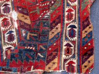 Kurdish/Anatolian fragment, early 19th Century or before, 38" by 46", with an extraordinary array of saturated colors.  Reddish wool wefts, white cotton warps.  Photos taken outside in mostly sunny conditions.  ...