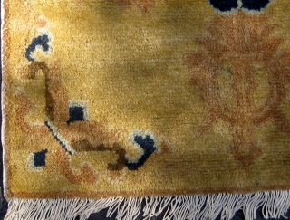 Antique double-dorje Chinese sitting mat, 19th Century, in excellent condition, original sides and ends, cotton warps and wefts, beautiful wool, roughly 26" square.  Please ask for additional photos    