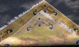 Antique double-dorje Chinese sitting mat, 19th Century, in excellent condition, original sides and ends, cotton warps and wefts, beautiful wool, roughly 26" square.  Please ask for additional photos    