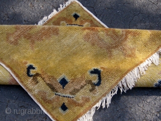 Antique double-dorje Chinese sitting mat, 19th Century, in excellent condition, original sides and ends, cotton warps and wefts, beautiful wool, roughly 26" square.  Please ask for additional photos    