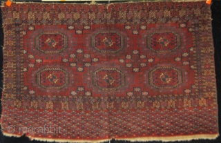 First half of the 19th Century (earlier?) Tekke chuval with 6 Salor guls.  Extremely finely knotted.  Profuse use of silk.  Asymmetrically knotted, open to the right.  48" by  ...