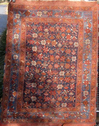 Antique Afshar with rare floral design circa 1880, all dyes natural, original flat weave ends and original sides, in lovely condition, 4'2" by 5'9".  Please ask for additional photos.   