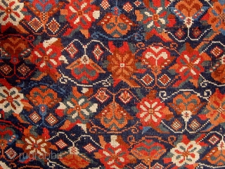 Antique Afshar with rare floral design circa 1880, all dyes natural, original flat weave ends and original sides, in lovely condition, 4'2" by 5'9".  Please ask for additional photos.   