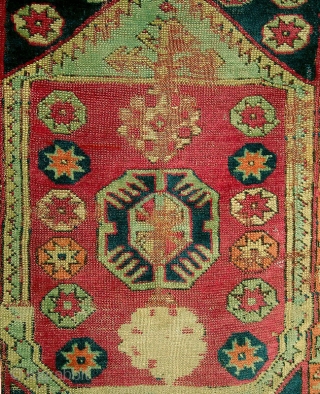 19th century Central Anatolian large yastik, lovely natural colors including madder, cochineal, apricot, various shades of blue, ivory, brown, etc.  In fragmented condition, but with original edges still present.  27"  ...