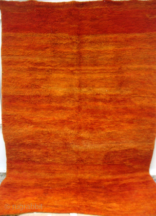 MOROCCAN MIDDLE ATLAS BERBER DOUBLE SIDED RUG. Both sides of this rare old tribal weaving are shown. It originates from the Beni Mguild Berber group of the Middle Atlas range east of  ...