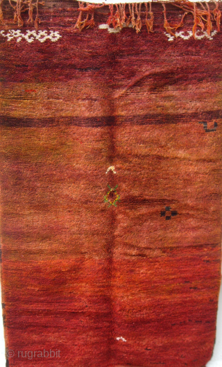 MOROCCAN BERBER MIDDLE ATLAS RUG from the region of Mrit. The field has many shades of terracotta, brown and deep reds and the "abrashes" are very attractive. Reference 2165. Size 187 x  ...
