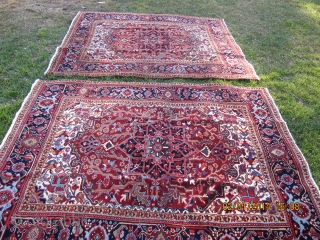 A pair of antique Heriz rugs from 1920's..all good colors and in perfect condition with uniform high pile and no repairs. each measures 6' 2" x 5'.
Prefer to sell as pair.  