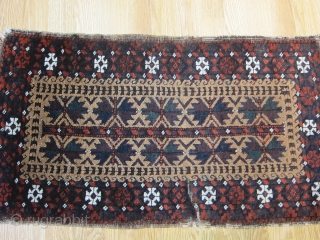 Antique camel wool ground Balouch balisht with nice dark bottle green and aubergine colors..it needs a good wash..it is in full thick pile condition with the exception of the fold wear (the  ...