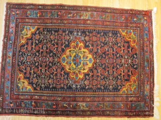 Antique Hamadan (Enjilas) rug with brilliant saturated colors, fine wool, thick MINT pile and floppy handle...beautiful yellows, light blues, and greens.
measures 60x44 inches          