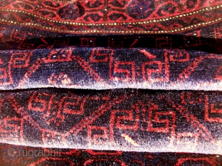 Antique complete large Baluch saddlebag with silky pile and fine weave. No repairs. few little dots of moth nibbles, otherwise, the pile is uniform and high. sides are original.Approximate size is 5'  ...